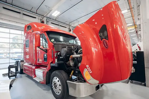 Securing Business Success with Reliable Heavy-Duty Truck Maintenance by FleetBarn